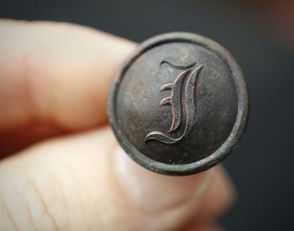 Nice Script I coat button from a construction site.