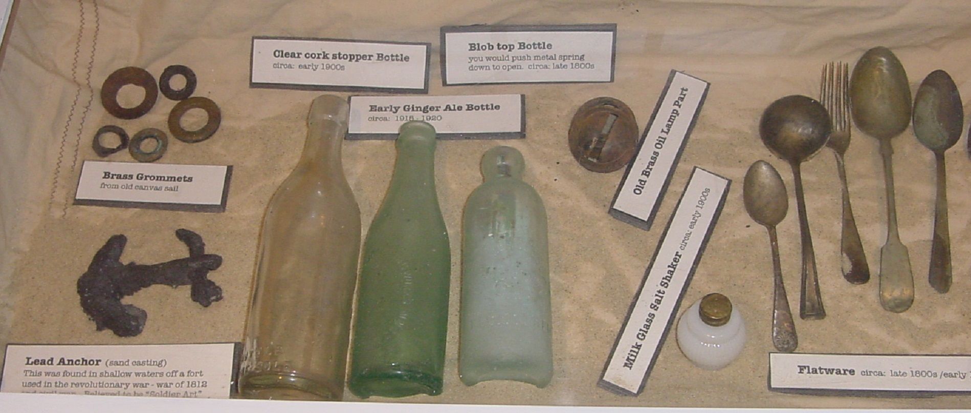 PART OF DISPLAY I PUT ON LOAN
THIS INCLUDES BRASS SAIL GROMETS - OIL LAMP PARTS - OLD BOTTLES - AND A FEW OTHER ITEMS