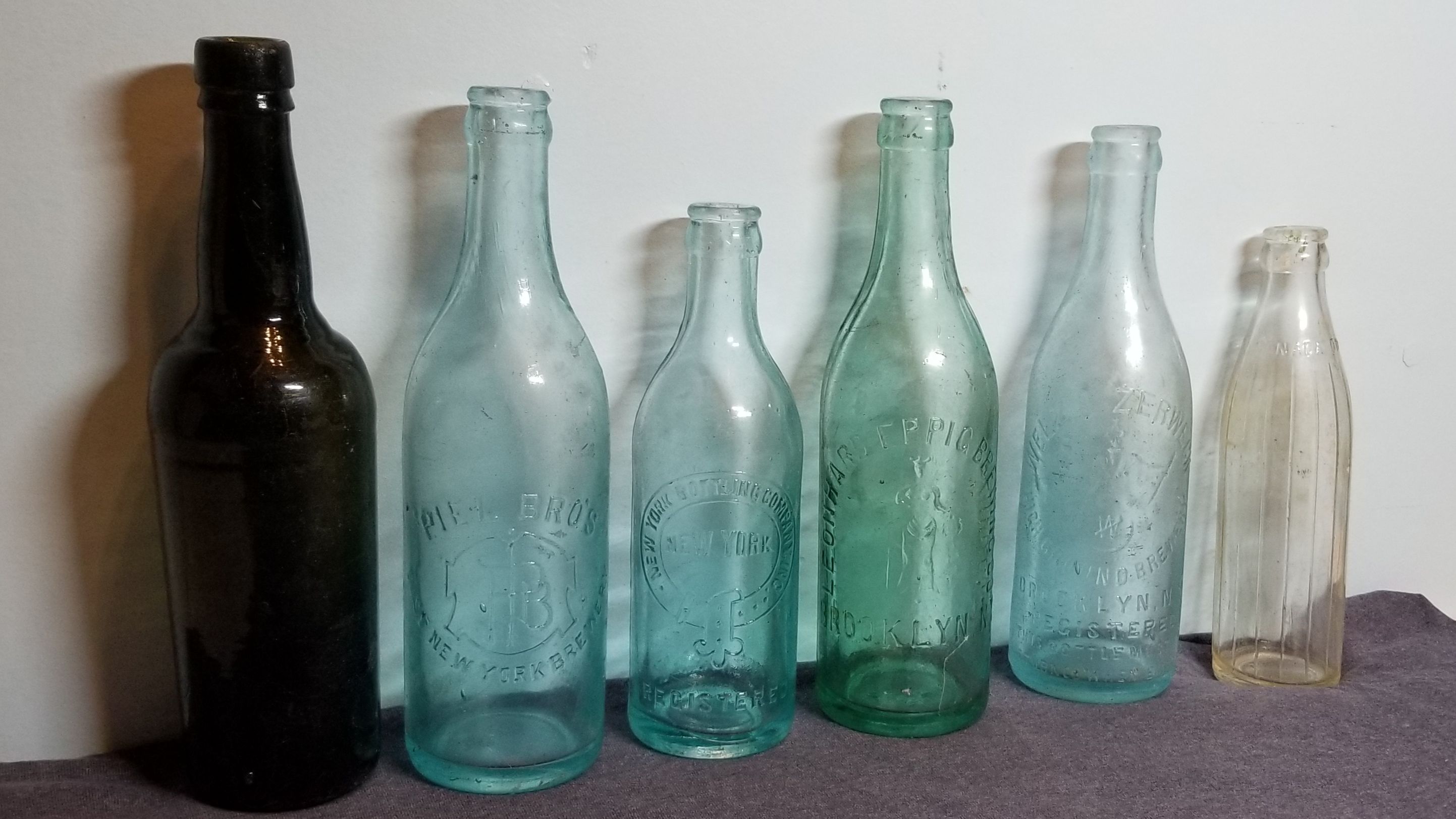 Pictorial Tooled Crown Beer Bottles