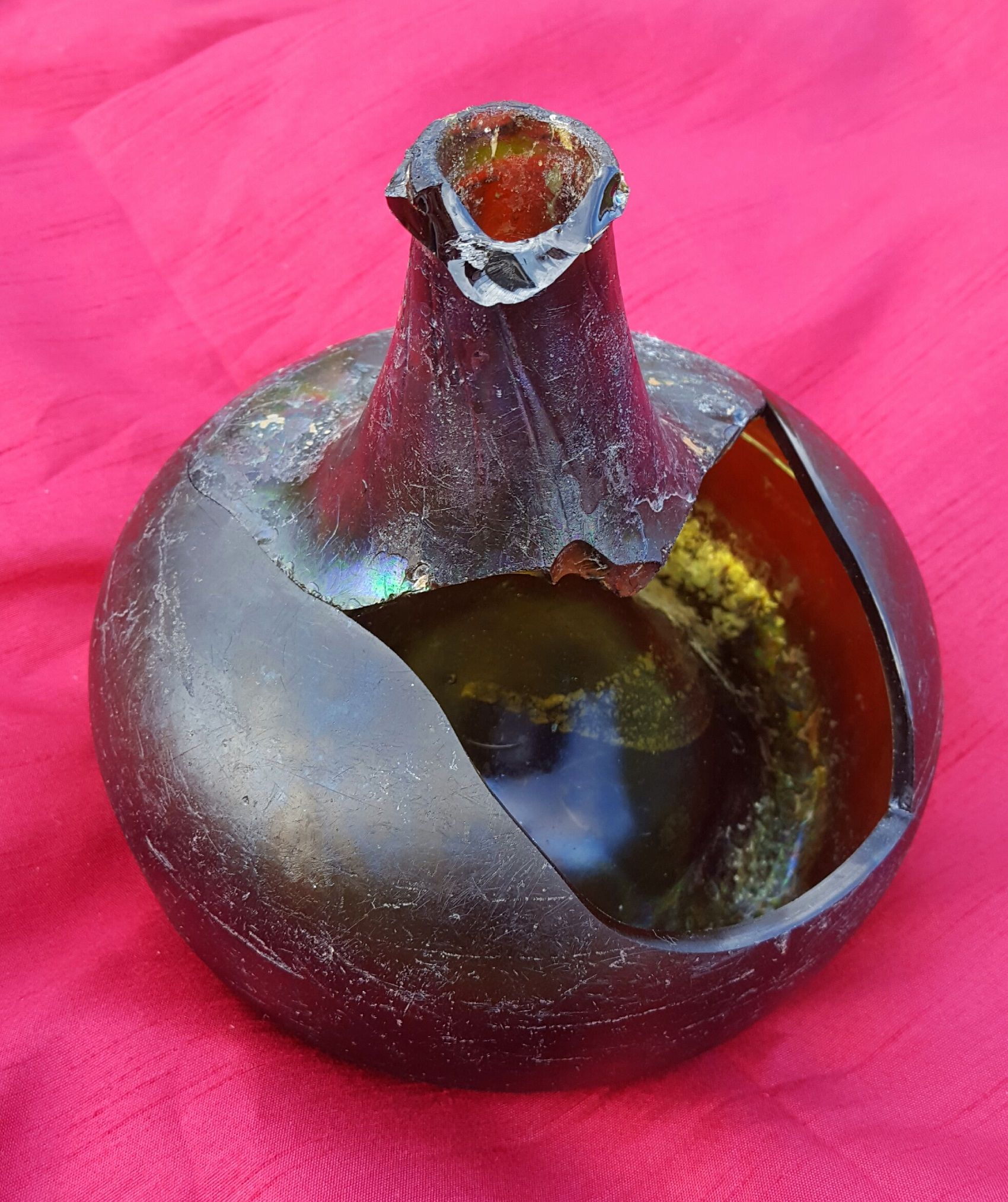 Reconstructed early 1700s black glass "onion" bottle