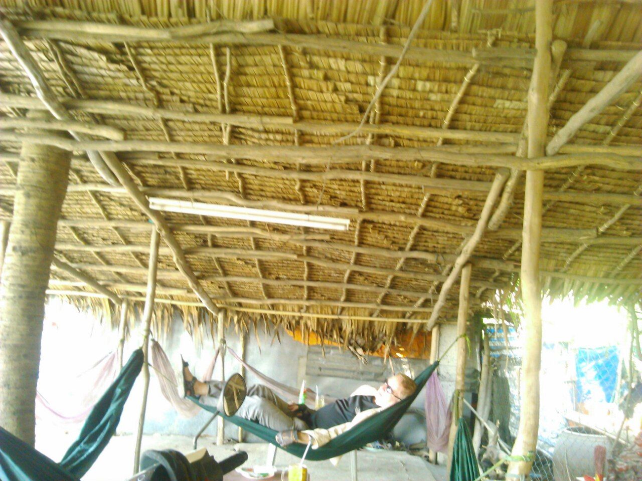 resting in a hammock at a coffee shop in the Mekong Delta