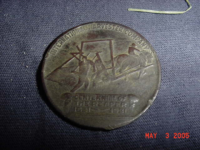Reverse of 1931 Token from the International Harvester Company celebrating the centennial of the McCormick Reaper