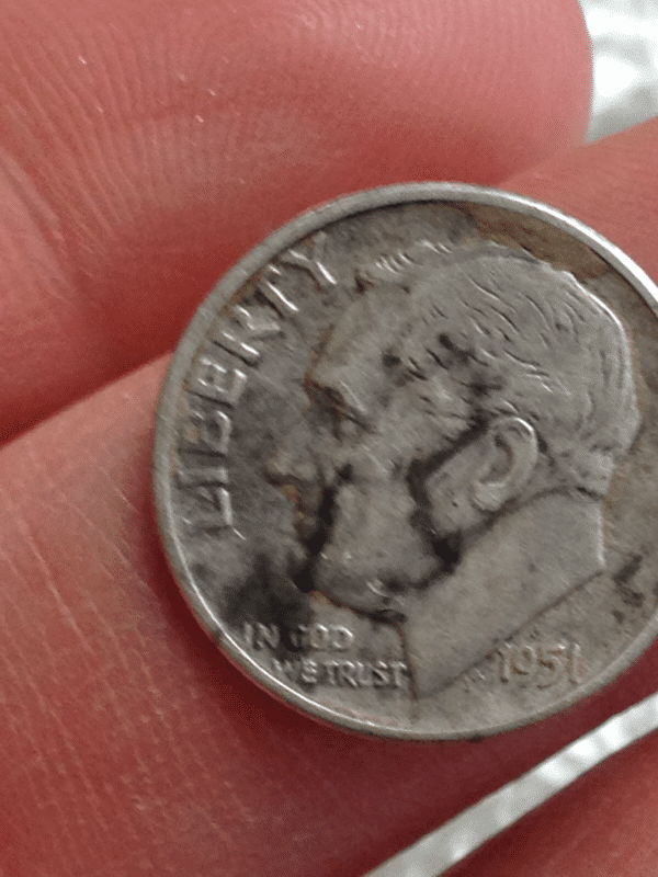 Second dime in hole with merc dime