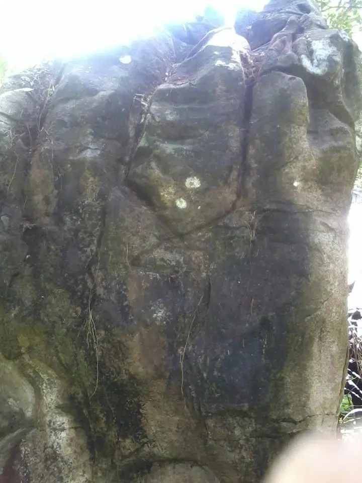 site 4: marker... look the arrow pointer downward...beside the marker carve of    XI