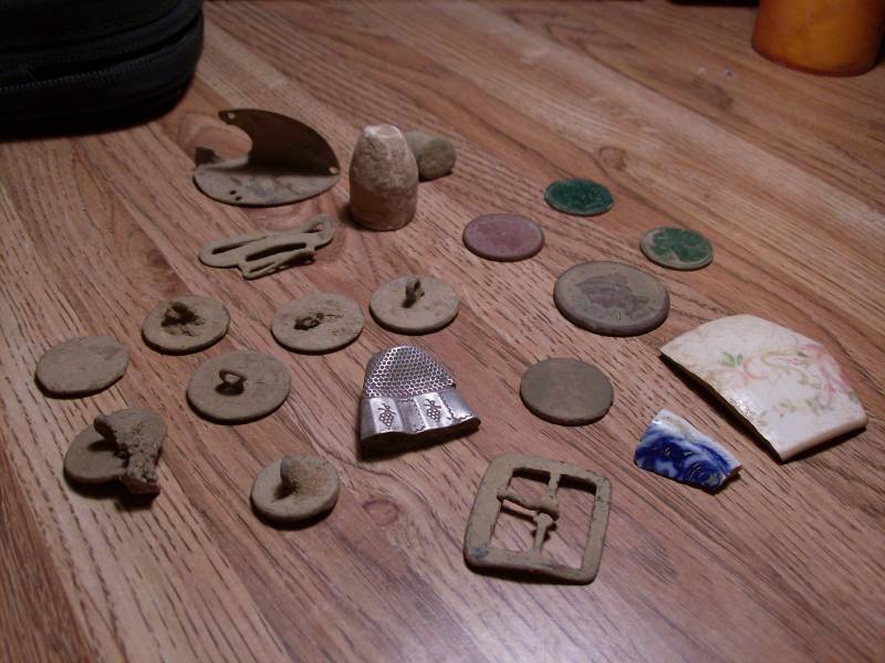 Some Cool Finds - Here's a silver thimble and some nice old coins...

There rest of the story is here:

http://forum.treasurenet.com/index.php/topic,1