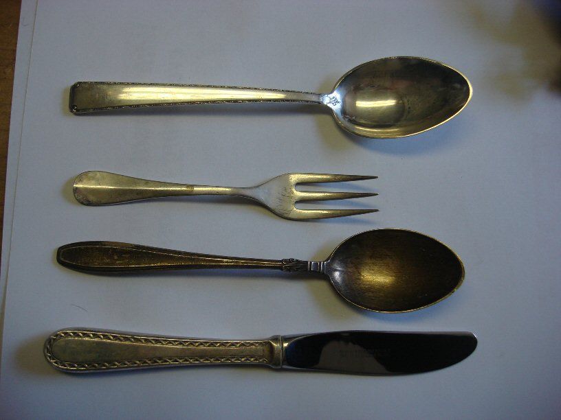 Sterling teas spoons, salad fork, and butter knife