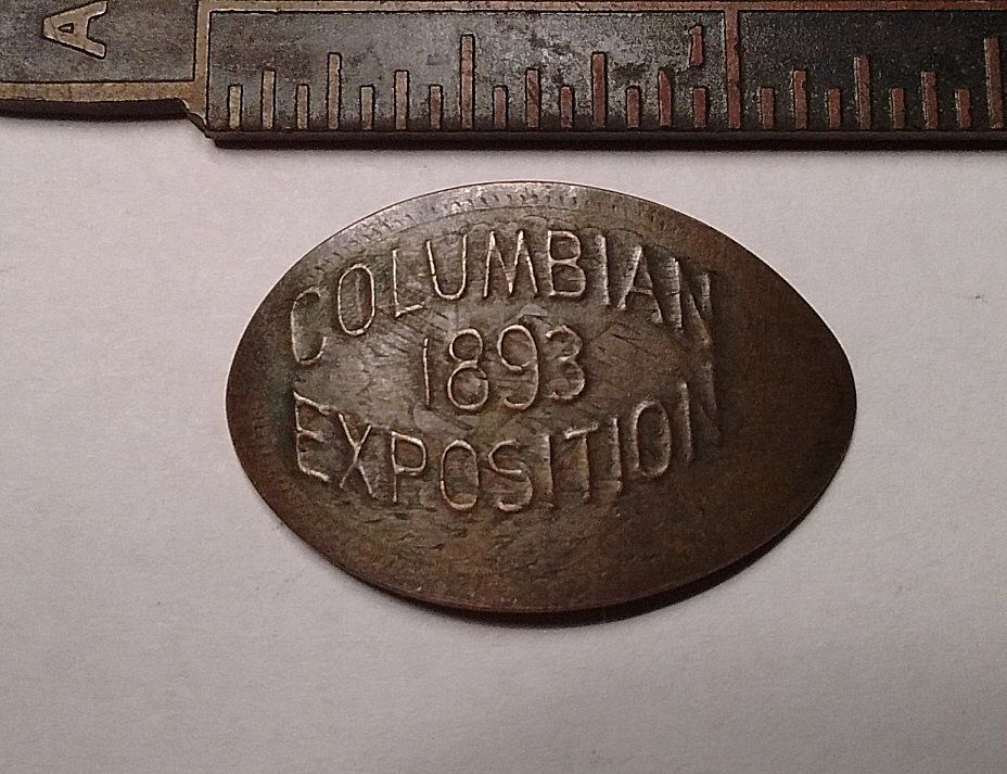 The first ever elongated souvenir penny. It was printed on a 1893 Indian Head cent at the Columbian Exposition World's Fair in Chicago.