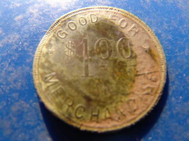 Token found in the same hole as a 2 franc coin. You can even see where the coin was laying on the face of this token.