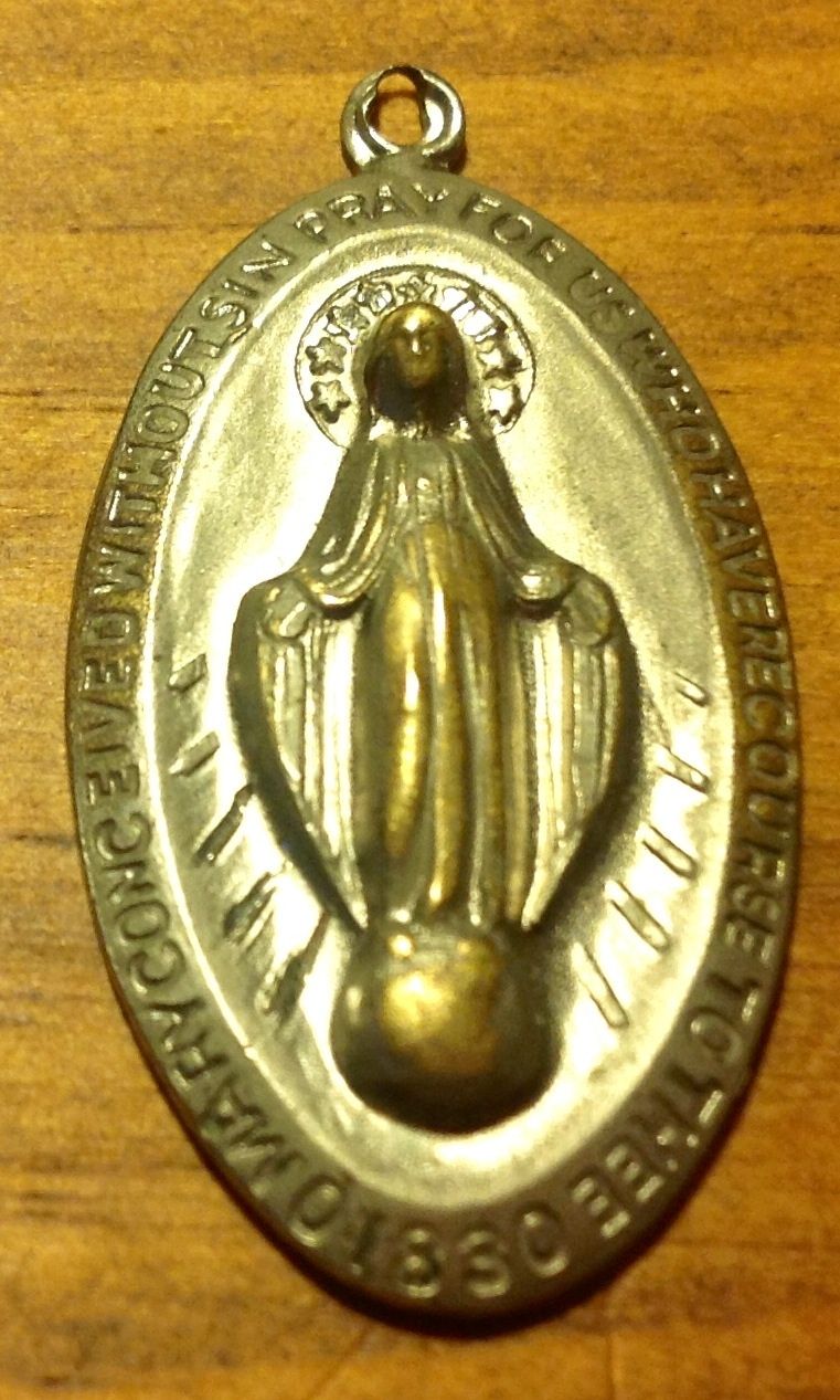 Virgin Mary Pendant
Sterling Silver
Found 1976
Columbus AFB, Ms