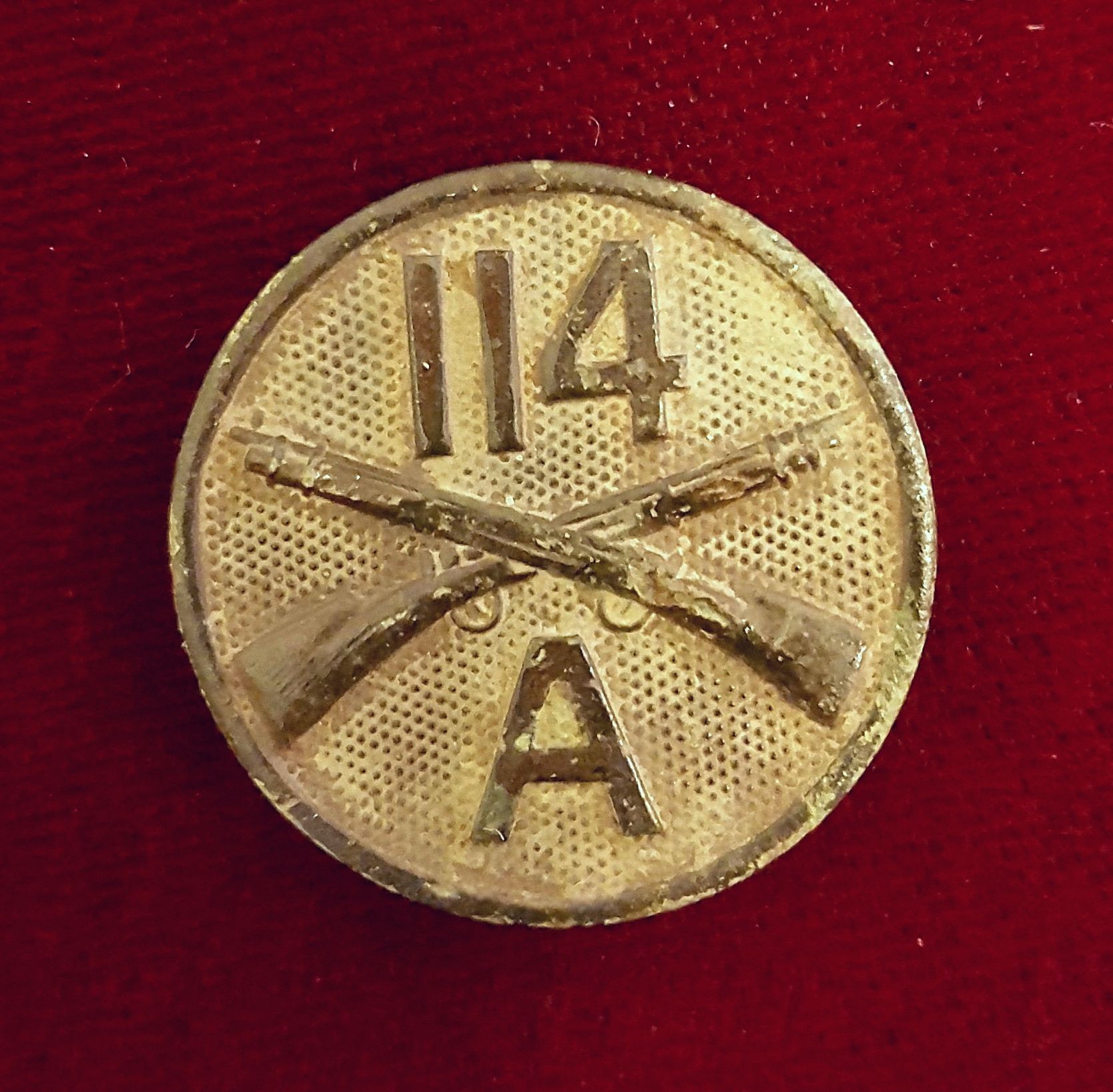 WWI era collar disk-114th Infantry Regiment, Company A.  Found at the same home site where I found the dog tag.